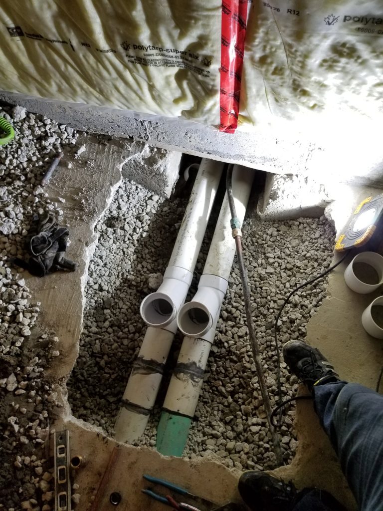 basement drain line repair in progress