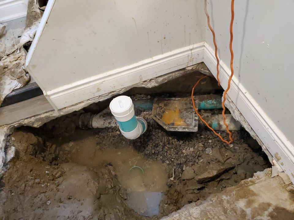 backwater valve connected to sewer pipe