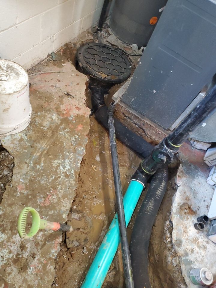 new sewer line to sump pump connection